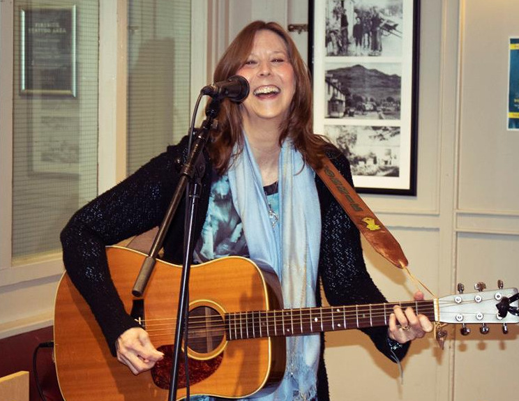 Connie MacLeod Singing at Wee Gig in the Goil, playing her Martin HD 28 acoustic guitar.