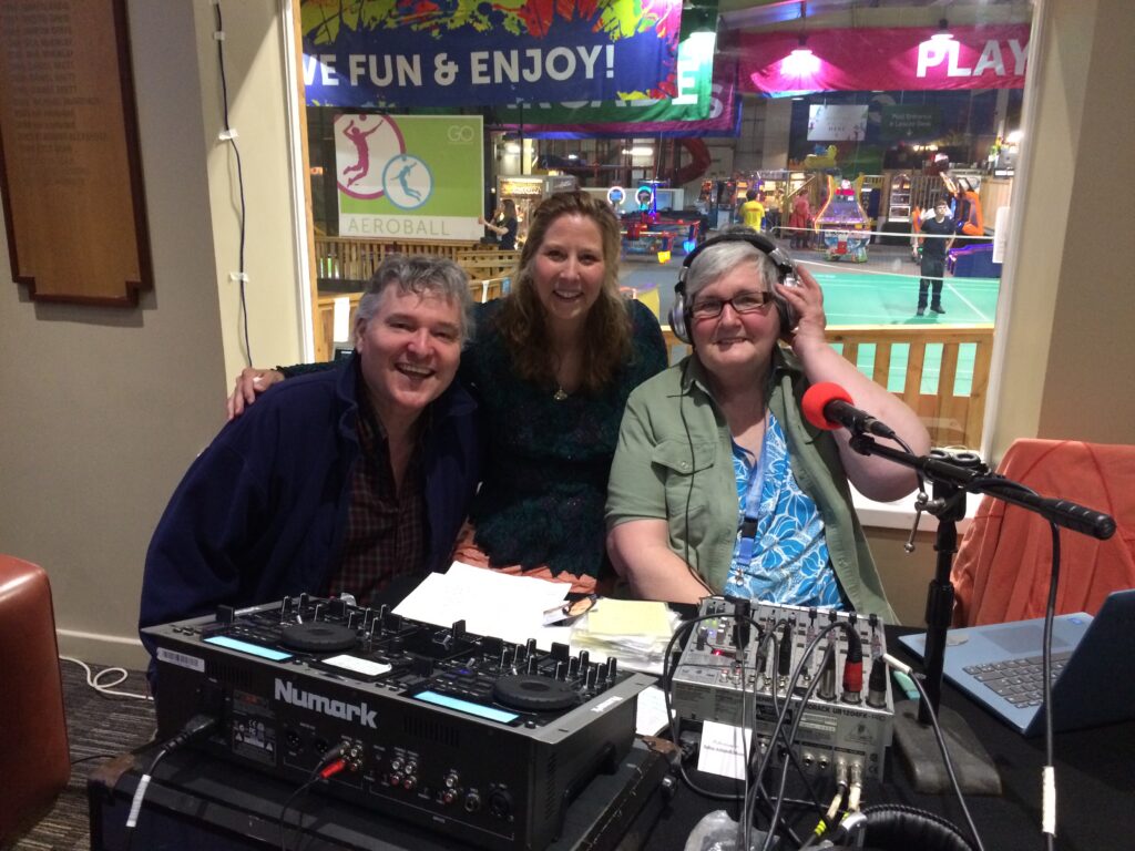 Connie MacLeod with husband Roddy being interviewed by Frilly on Dunoon Community Radio 97.4 FM at Gig in the Goil.